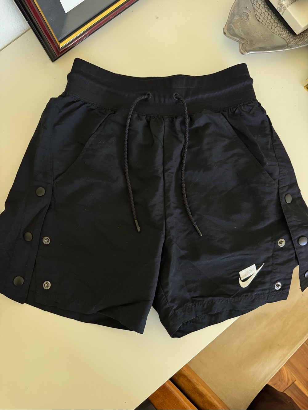 Vintage Nike Black Athletic Snap-Trim Shorts with White Swoosh XS